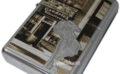 Zippo lighter features a design of the original Zippo factory and Windy